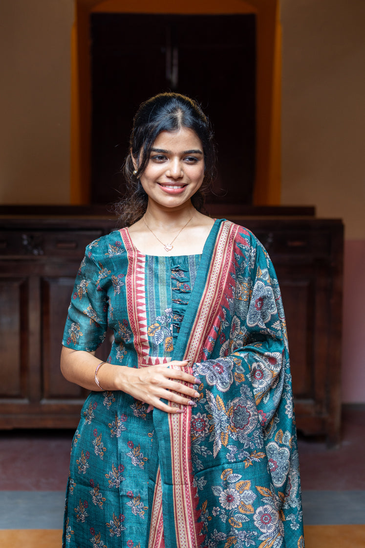 Teal Salwar Kameez with Floral Elegance